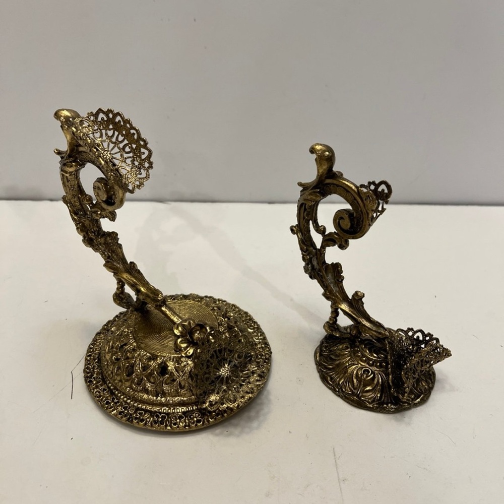 Two brass holders